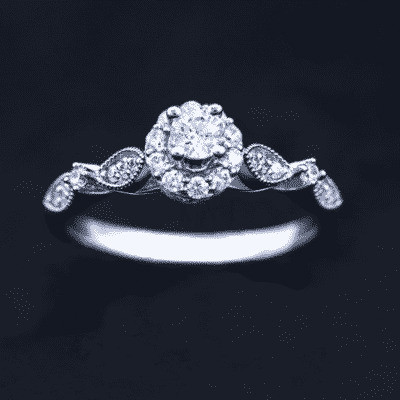 Nhẫn đính hôn R247 thiết kế sang trọng với đá chủ và đá tấm xung quanh