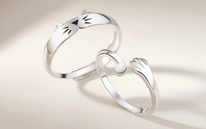 Mẫu nhẫn cặp học sinh có họa tiết mỏ neo và bánh lái tàu cute