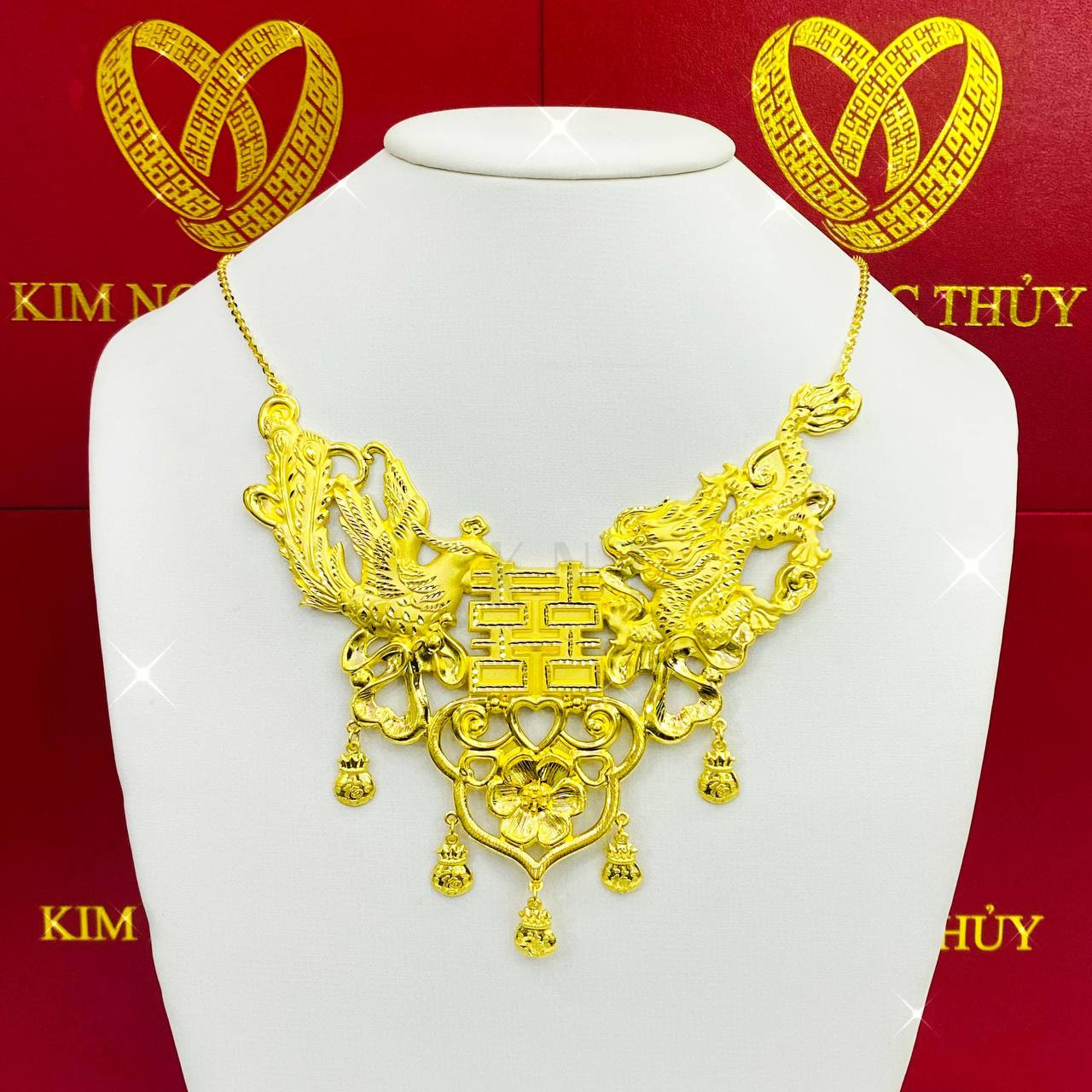 Dây chuyền Long Phụng Sum Vầy: Vàng 24K, mang biểu tượng của tình yêu, hạnh phúc bền lâu