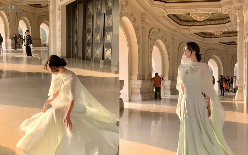 Váy hai dây khoác khăn choàng lụa mỏng qua vai một cách thanh lịch 