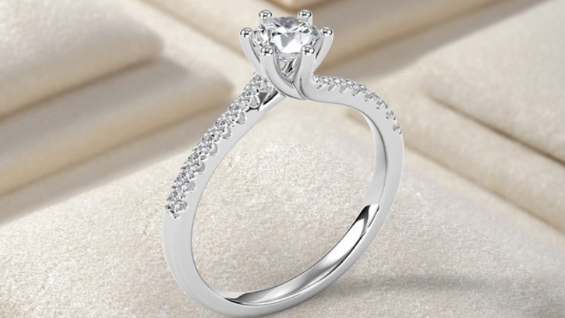 Nhẫn pave với viền đá tấm được nạm sát nhau dọc theo đai nhẫn